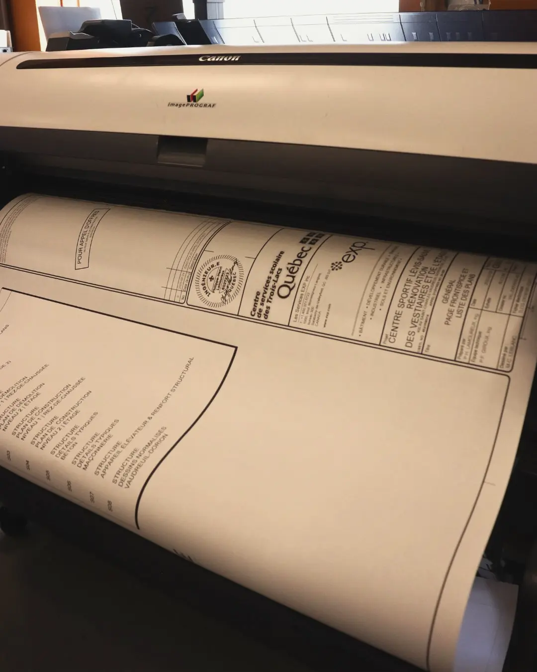 A technical drawing coming out of the large format plotter